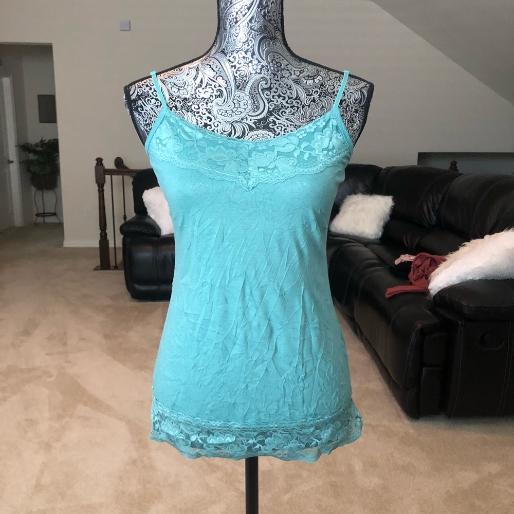A green/blue tank top.
